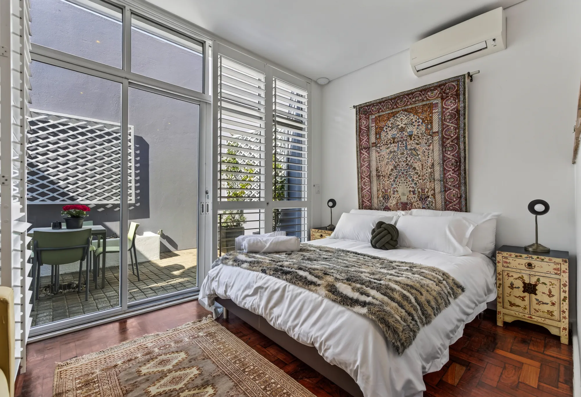 A Casa Dias bedroom opening onto the courtyard